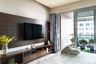 TV Unit Design WIth Dark Wood TV Console, Open And Closed Storage - Livspace