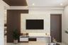 Wood And White Spacious TV Unit Design With Wooden Wall Fluted Panelling - Livspace