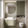 Minimal Bathroom Design with Round Mirror and Green Beige Tiles