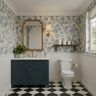 Traditional French Country Bathroom Design with Navy Blue Wood Vanities