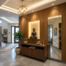 Contemporary Foyer Design with Teak Credenza and Gold Mirror Screen
