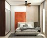 Mid-Century Modern Guest Bedroom Design with Color Block Wall and Storage Unit