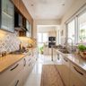 Parallel Kitchen Design with Cream and Walnut Bronze Cabinets