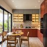 L Shaped Kitchen Design with Orange Cabinets and Ribbed Glass