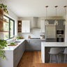 Island Kitchen Design with White Cabinets and Gold Pendant Lights