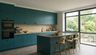 Island Kitchen Design with Deep Teal Cabinets and Corian Counters