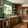 Contemporary Walnut Bronze Open Kitchen Design with Deep Green Tile Backsplash