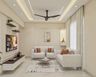 Living Room Design with Beige Sofas and Backlit Mandir