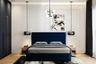 Modern Master Bedroom Design with Deep Blue Bed and Grooved Panels