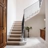 Classic Staircase Design with Marble Finish and L-Shaped Layout