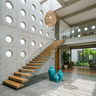 Modern L-Shaped Staircase Design with Wood and Glass Railings