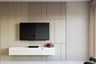 Minimal TV Unit Design with White Marble Console and Geometric Wall