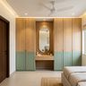 Scandinavian Wardrobe Design with Aqua Green Cabinets and Oval Vanity Mirror