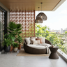Balcony Design with Rattan Sofa and Glass Railing