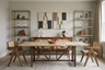 Dining Room Design with Travertine Stone Table and Brass Shelving