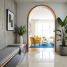 Concrete Grey Foyer Design with Storage Bench and Wood Framed Archway