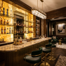 Dark Walnut Wood Home Bar Design with Backlit Onyx Glass Shelves