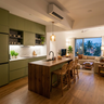 Olive Green Island Kitchen Design with Timber Island and Rattan Seating