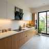 Wood and White Straight Kitchen Design with Quartz Countertop
