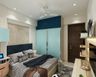 2-Door Blue Swing Wardrobe Design with Loft for Kids Bedroom.