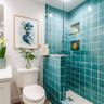 Contemporary Bathroom Design with Turquoise Tiles and Vanity Storage