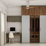 Contemporary Home Office Design with Wooden Desk and Wardrobe