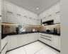 Classic Off White U-Shaped Kitchen Design with Granite Countertops