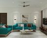Contemporary Living Room Design with Teal Sofa and Gold Coffee Tables
