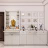 White Modern Pooja Design with Open Shelving and Mirror Feature Wall