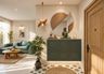 Green Foyer Design with Floating Cabinet and Buddha Statue
