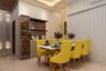 Contemporary Yellow Dining Room - Livspace