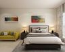 Compact Guest Bedroom With Yellow Seater - Livspace