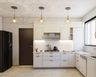 Modular All-White Kitchen Design - Livspace