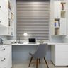Modern Frosty White Home Office Design With Overhead Cabinets - Livspace