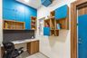 Blue And Wood Home Office Design - Livspace