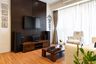 Living Room with Fluted TV Unit Design In Wood - Livspace