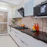 Noida Modern 3-BHK Flat With A Straight Kitchen - Livspace