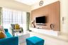 Spacious living room with white and wood TV console - Livspace