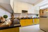 15x9 Ft Parakeet and Champagne L-Shaped Modern Kitchen - Livspace