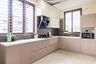12x10 Ft Light Beige and Champagne L-Shaped Contemporary Kitchen - Livspace