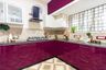 15x10 Ft Aubergine Toned L-Shaped Modular Kitchen - Livspace 15x10 Ft L-Shaped Aubergine-Toned Kitchen Design With Wall Extension - Livspace