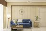 12x11 Ft Living Room Design With Dark Blue Velvet Sofa And Beige Wall Panel With Grooves - Livspace