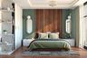 Art Deco Master Bedroom Design With Dark Green Accent Wall And Wooden Fluted Panels - Livspace