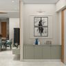 Foyer Design with Monochromatic Art Grid and Picture Light