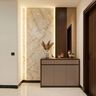 Irish Cream Foyer Design with Backlit Stone Slab and Dark Wood Slats