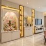Pooja Room Design with Floral Carved Arch and Lotus Backdrop Wall