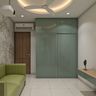 Wardrobe Design with Glossy Teal Sliding Doors and Console