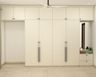 White Swing Wardrobe Design with Built-in Dresser Unit