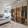 White 6-Door Swing Wardrobe Design with Fluted Glass Shutters and Internal LED Lighting