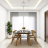Modern Spacious 4-Seater Dining Room Design Idea with Potted Plant - Livspace